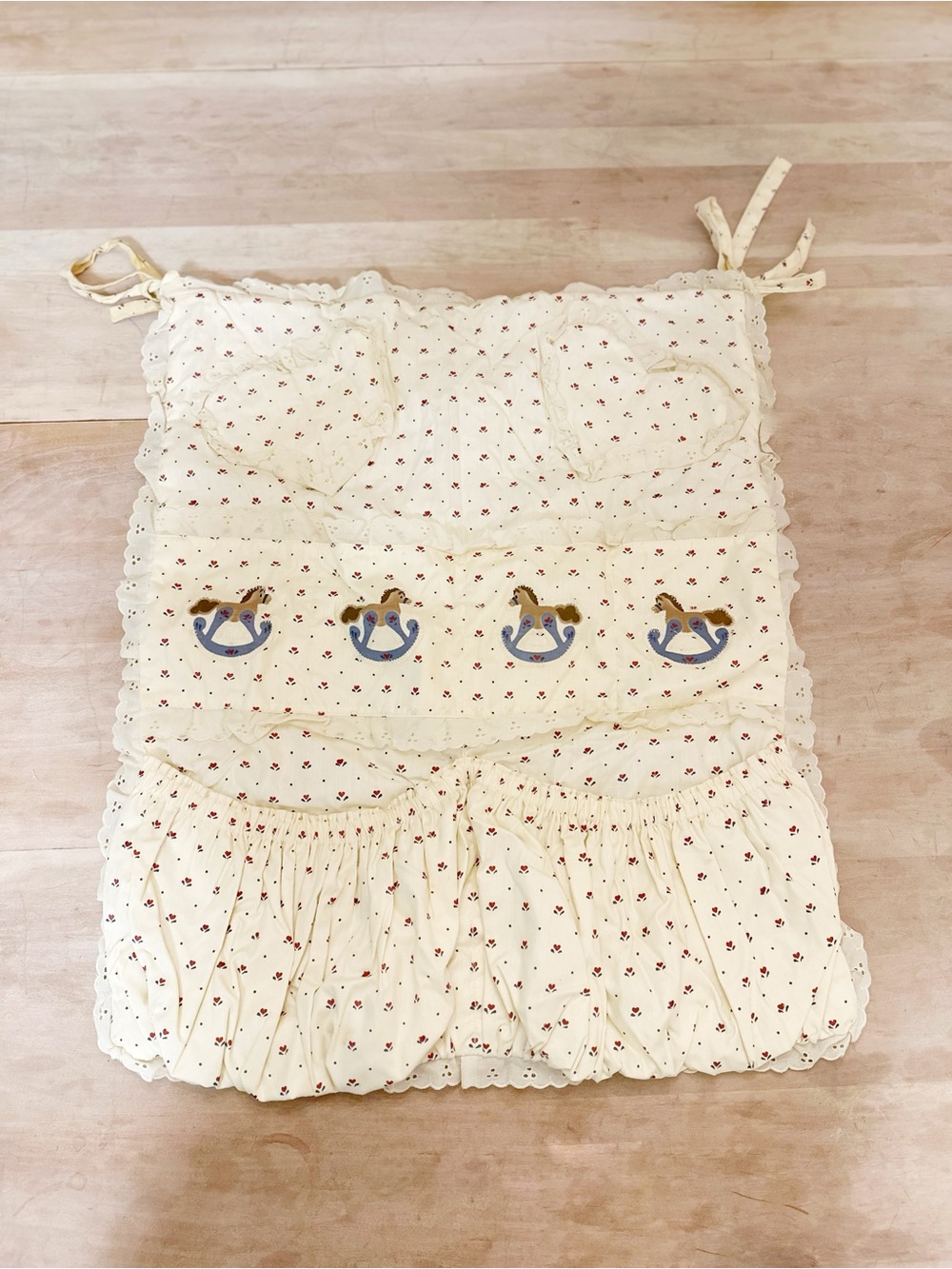 Nursery crib skirt and organizer